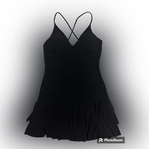 perfect little black dress Cross straps in back bodycon ruffle bottom medium